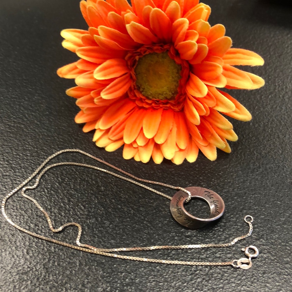 Silver necklace with charm